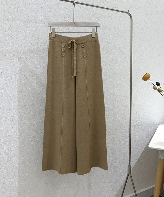 Bbuckkooki - Pantalon large en maille boutonnée à taille bande