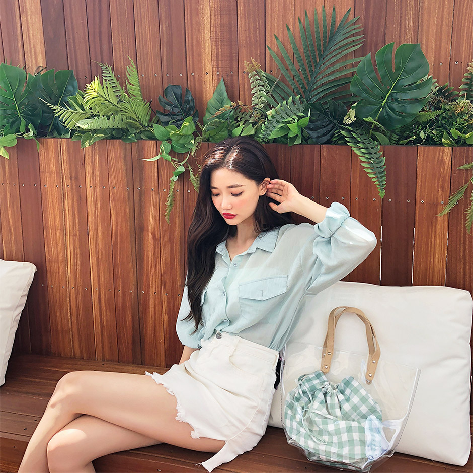 chuu - Chemise transparente à manches longues et poche sur le devant