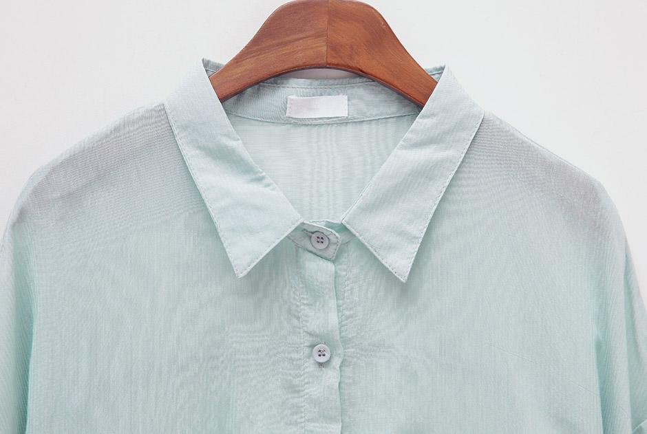 chuu - Chemise transparente à manches longues et poche sur le devant